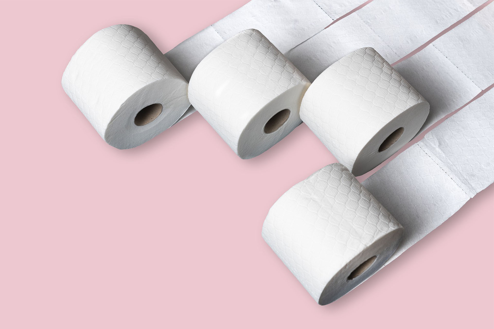 001604_LC-UTISocialPlan-Blog Four rolls of toilet paper on a pink background