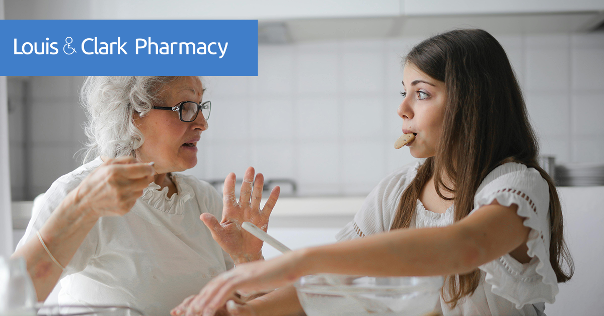 008408-LC-WorldAlzheimer’sMonth-CC-1200x628_ Young woman spending time with grandmother at home to illustrate Alzheimer’s Month